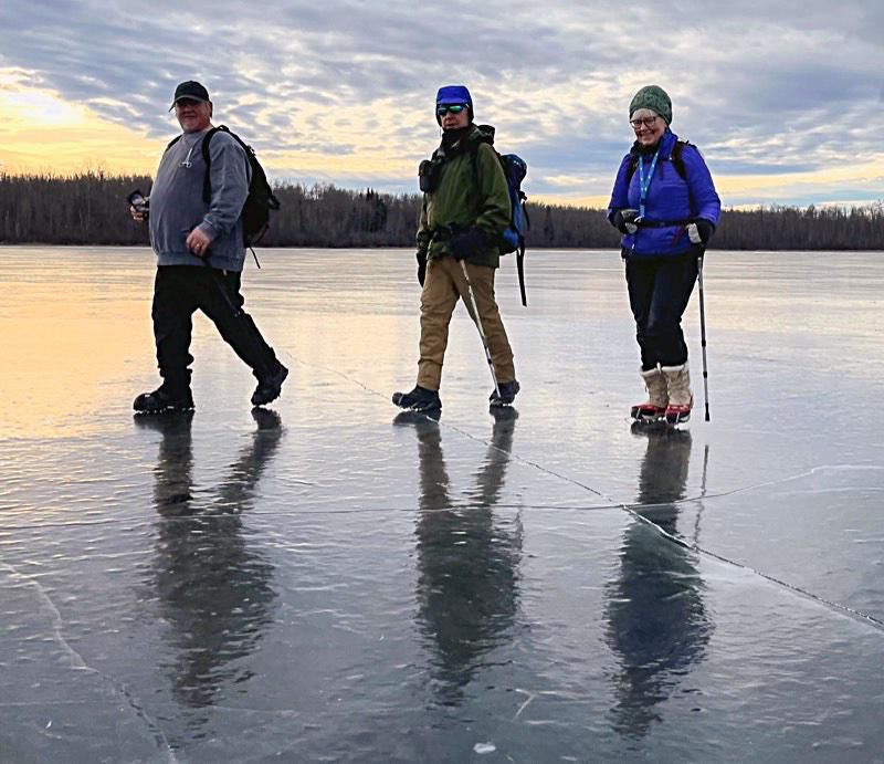 Three cachers walking on the ice